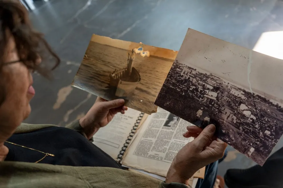 Una ciudad devastada y el hombre que remó en penumbras: los archivos de Don Jorge Memmel.  Foto: Marcelo Rodríguez